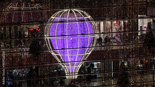 New York,New York USA Christmas decorations at The Shops shopping mall in the Hudson Yards district at night. 