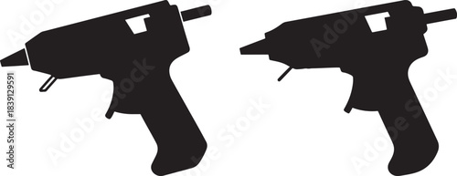 Two black hot glue gun tools silhouette