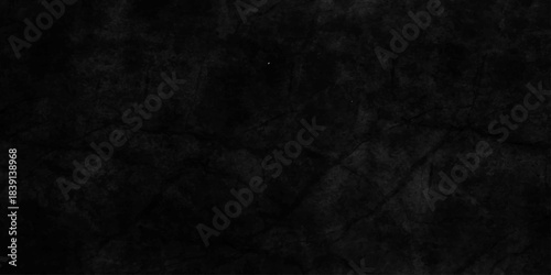Dark grunge texture with deep black and charcoal tones, featuring rough, cracked surfaces and subtle scratches. cement concrete wall and ceramic tiles background. gray dirty stan, rusty metal texture.