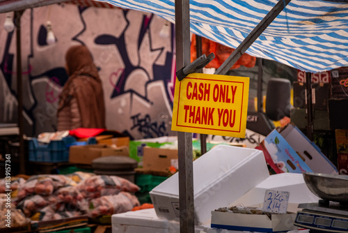 LONDON -  Whitechapel Market – “Cash Only Thank You” sign at traditional food stall