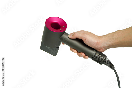 Hair dryer in hand isolated on white background, clipping path