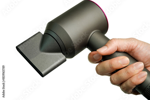 Hair dryer in hand isolated on white background, clipping path