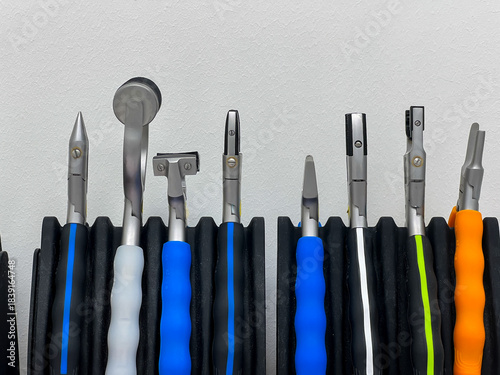 Professional optician tools, showing precision instruments for eyewear adjustment, useful for optical and medical industry. Nosepad, bridge and cutting pliers.