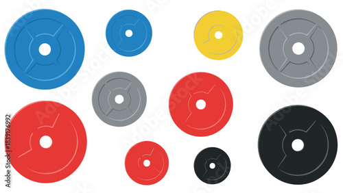 Colorful gym plates set in various sizes and shades on white background