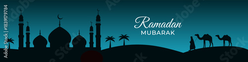 Horizontal vector banner with the text Ramadan Mubarak and silhouettes of a mosque and camels. Suitable for a website header.