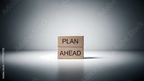 Wooden blocks stacked with the words plan ahead