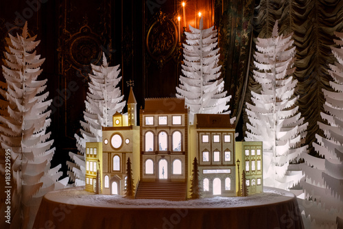 Cardboard Model Of A Large Town House Amongst Fir Trees