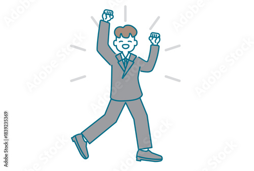 腕を上げて嬉しそうにガッツポーズをとるビジネスマン