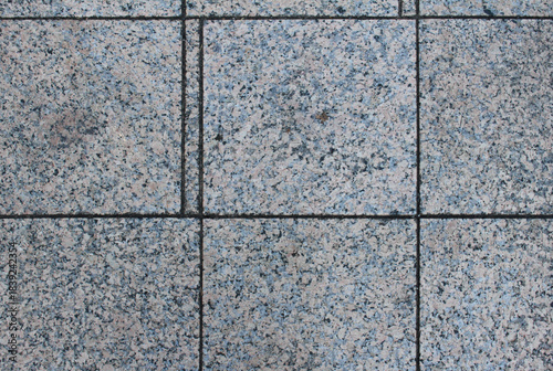 Wallpaper Mural Texture of cracked square paving tile. Pattern of beige and gray tiles in the street. Concrete pavers close up background. Torontodigital.ca