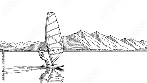 Monochrome wind surfer in action against mountainous backdrop