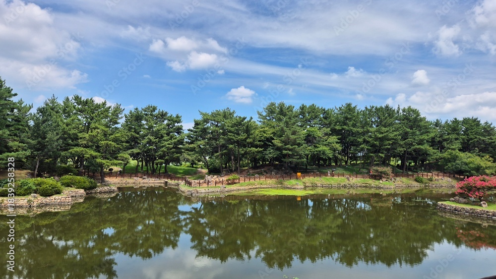 Fototapeta premium Historic Palace Pond at Night with Reflections — Traditional Korean Architecture