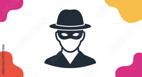 Dark silhouette of a person wearing a hat and mask, representing anonymity or a spy theme.