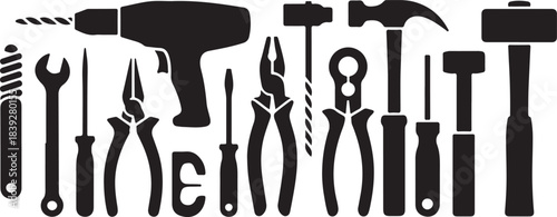Various hand tools are laid out precisely in a stark black silhouette against white