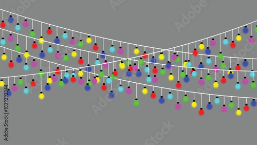 Colorful string lights festive decoration on gray background