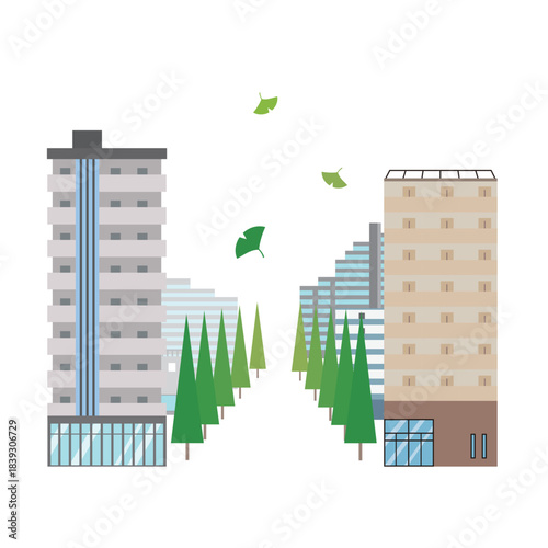 緑のイチョウ並木とマンション