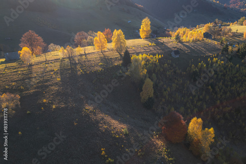 Sunny Autumn Aerial View of a Traditional Romanian Village in Transylvania