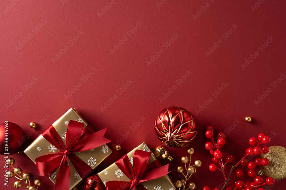 Fototapeta premium Luxurious red and gold gift setup with ribbons, ornaments, and berries on a rich backdrop, capturing festive warmth for Christmas and New Year celebrations