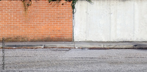 Wallpaper Mural Boundary wall divided in two part, brick wall on the left  and prefab concrete on the left. Cement sidewalk and street in front. Background for copy space. Torontodigital.ca