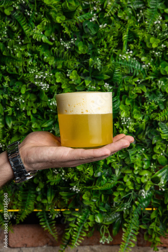 A delicious alcoholic cocktail at the bar. The bartender prepares cocktails