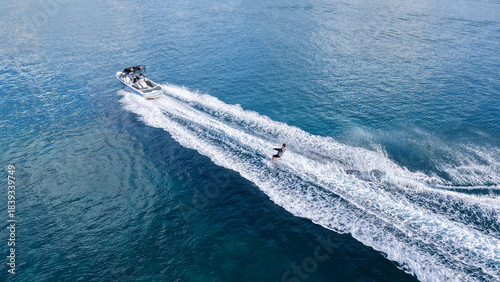 Schilderij op canvas Aerial drone photo of water skier practice in open ocean sea