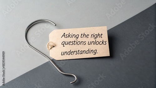 Wooden tag with text asking right questions for better understanding