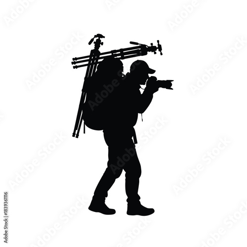 Photographer with camera and backpack silhouette