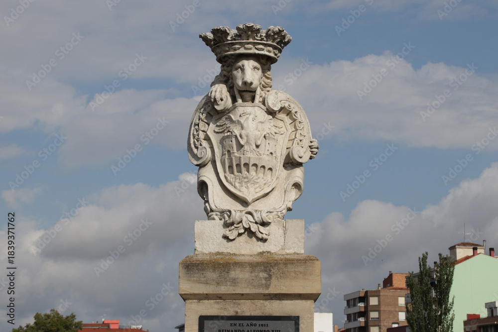 Obraz premium sculpted lion and blazon at the charles III bridge in miranda de ebro in spain 