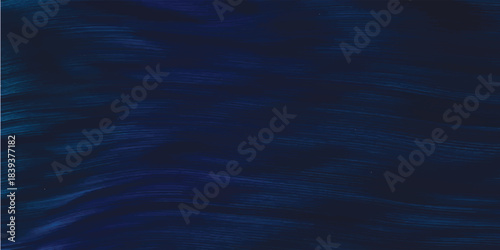 Dark blue abstract background of rippling water surface texture with light reflection