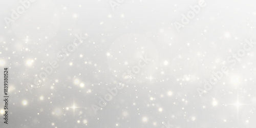 Magic glow and sparkling fireworks shine in a flash of shiny brilliance. Glistering twinkle trails scatter across the vector background with festive energy.