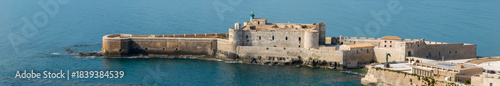 Fotografie Aerial view of Maniace Castle (in dialect, Castello Maniaci) located on the island of Ortigia, in the historic centre of Syracuse, Sicily, Italy