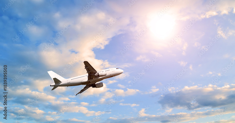 Obraz premium Flying airplane, travel background with airplane flying in the sky - airplane background, concept of air travel