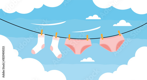 Freshly washed pink underwear and white socks hanging on a clothesline to dry in a bright blue sky with fluffy white clouds.