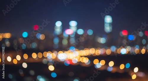 Wallpaper Mural Blurred cityscape at night with various colored lights, creating abstract, soft focus effect, representing urban life, energy, and festive atmosphere Torontodigital.ca