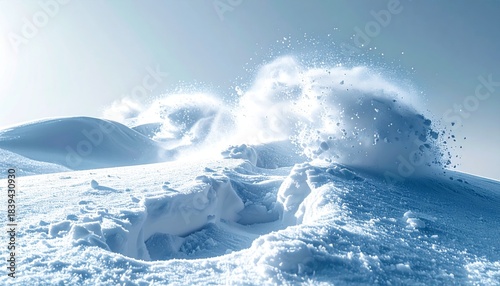 Powdery Snow Exploding Over Icy Hilltop Under Bright Sunlight