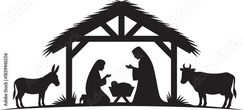 Traditional silhouette of the holy family and animals in a stable