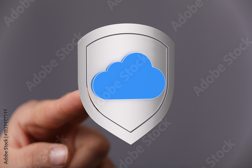 Hand holding cloud symbol i...