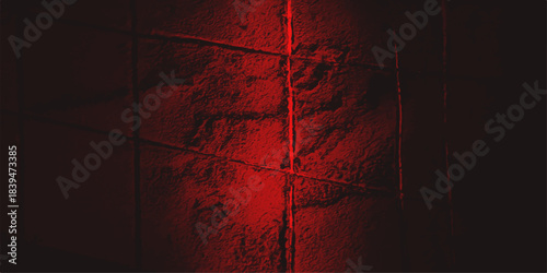 Abstract grunge red and black wall texture pattern with dark light design backdrop. Dark red grunge texture pattern design with a vintage, blood-like wall backdrop for a textured frame illustration. 