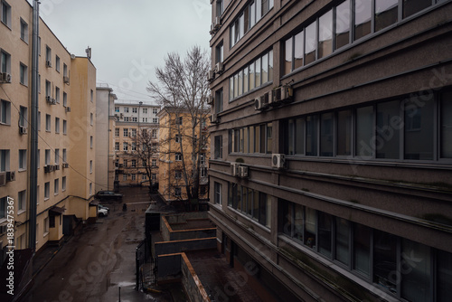 A city street on a cold cloudy rainy day