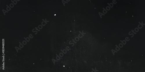 grunge scratch and dust on black background,retro noisy grain dust texture for film or photo overlay,old photo overlay texture,black grainy background pattern