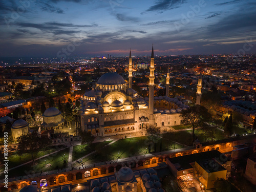 Aerial evening sunset shot of Suleymaniye Camii - Suleymaniye Mosque - in Istanbul. View of the Galata Bridge and the Bosphorus - Istanbul at sunrise, Turkey