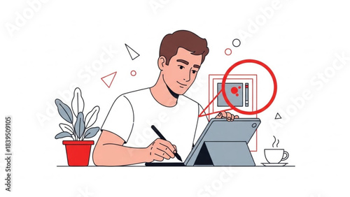 Young man drawing or editing on a digital tablet with stylus