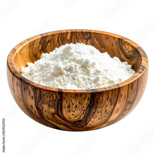 A close-up of white powder in a richly grained wooden bowl against a black background.