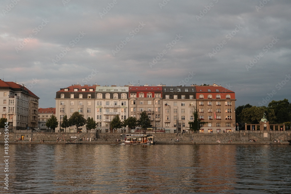 Obraz premium Prague Riverside Buildings Evening Light Reflections