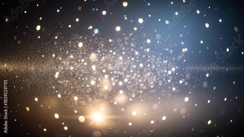 Abstract shimmering gold particles floating on dark blue gradient background with glowing lens flare and bokeh effects for festive overlay