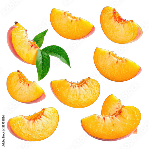 Vibrant peach slices with fresh green leaves isolated against a stark black background.