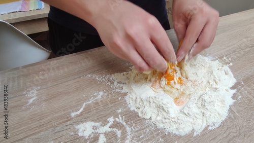 Preparing pasta carefully with flour and eggs