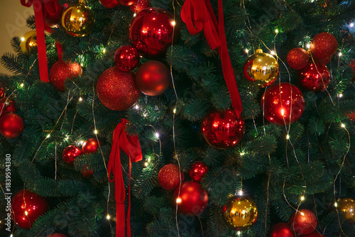 Christmas tree background with red and gold baubles decorations