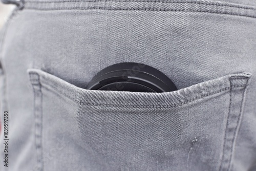 A box of snus pads in a jeans pocket. Swedish nicotine pouches