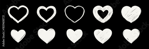 Set of white chalk grunge heart drawing on the blackboard. Punk rock hand drawn charcoal, crayon, pencil doodle design element. Freehand handwriting scribble. Paint brash grunge shape