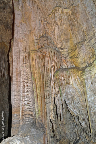 Massive Limestone Columns in a Deep Cave